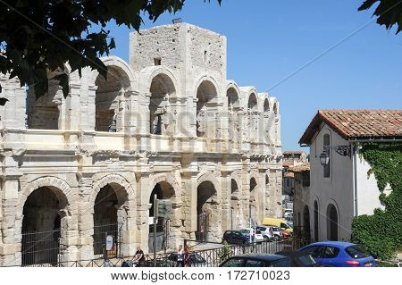 People Walking In Front Of The Amphithater At Arles