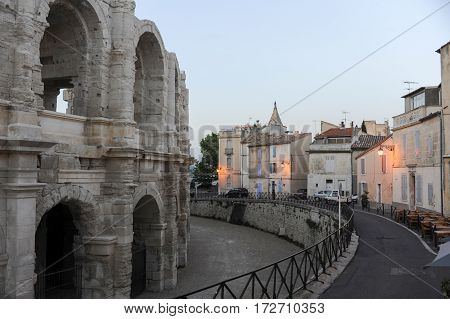 People Walking In Front Of The Amphithater At Arles