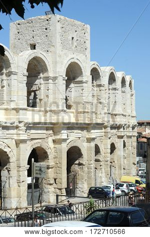 People Walking In Front Of The Amphithater At Arles
