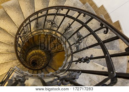 Abstract shot looking down a sprial staircase