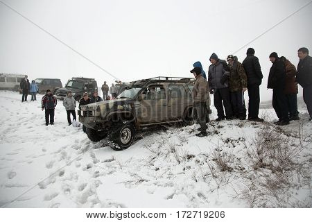 ALMATY, KAZAKHSTAN - FEBRUARY 21 2013: Off-road racing on jeeps Car competition ATV. Traditional race 