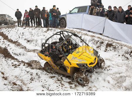 ALMATY KAZAKHSTAN - FEBRUARY 21 2013: Off-road racing on jeeps Car competition ATV. Traditional race 