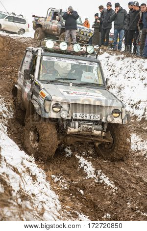 ALMATY KAZAKHSTAN - FEBRUARY 21 2013: Off-road racing on jeeps Car competition ATV. Traditional race 