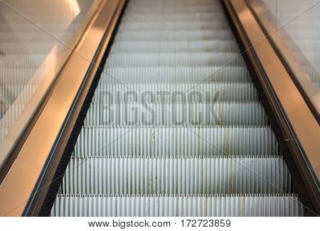Modern escalator in shopping mall 1 .