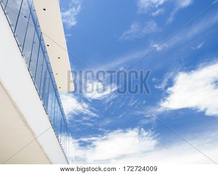 Reflections of the horizon on the balustrade of the balcony