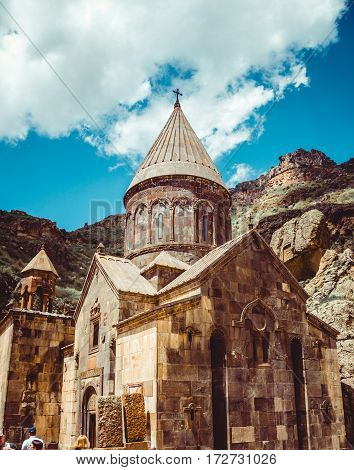 Geghardavank or Geghard monastic complex is Orthodox Christian monastery located in Kotayk Province, Armenia. Armenian architecture. Pilgrimage place. Religion background. Travel concept. Vertical