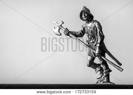 Iron soldiers. Spanish halberdier middle ages. Black paint.
Such souvenirs are sold small shops.