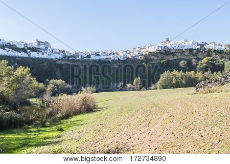Panoramic of Arcos de la Frontera white town built on a rock along Guadalete river in the province of Cadiz Spain