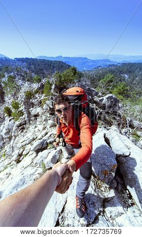 Help support and help in a dangerous situation to hike in the mountains.