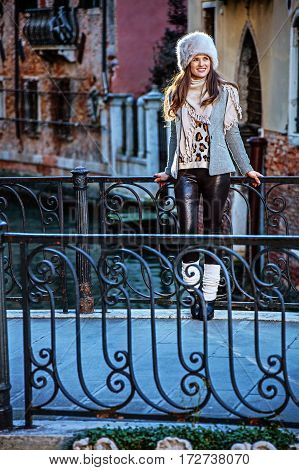 Tourist Woman In Venice, Italy In Winter Looking Into Distance