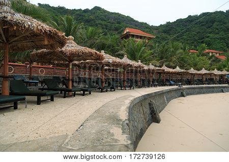 Beach landscape with lounge chairs in Vietnam's island