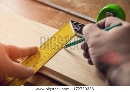 Measuring The Wooden Board