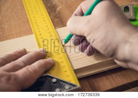 Measuring The Wooden Board