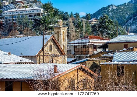 Mountain picturesque village of Kakopetria in a snowy day. Nicosia District Cyprus.