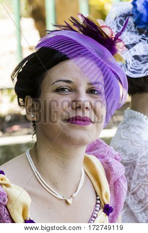 CAGLIARI, ITALY - May 29, 2016: Sunday at La Grande Jatte VIII Ed. At the Public Gardens - Portrait of a beautiful woman in Victorian costumes - Sardinia