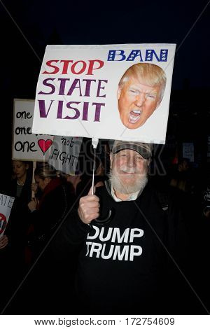 London United Kingdon - Febuary 20th 2017: Protesters gather in Parliment Square to protest the invitation to United States President Donald Trump on a state visit to Great Britain as Parliment debate the visit