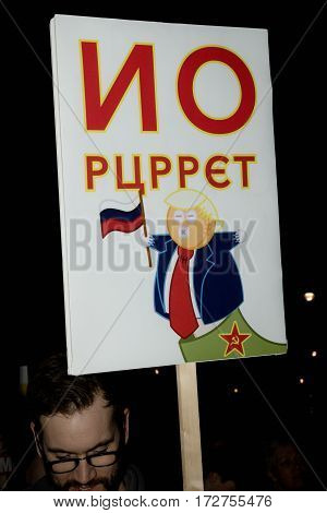 London United Kingdon - Febuary 20th 2017: Protesters gather in Parliment Square to protest the invitation to United States President Donald Trump on a state visit to Great Britain as Parliment debate the visit