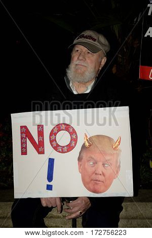 London United Kingdon - Febuary 20th 2017: Protesters gather in Parliment Square to protest the invitation to United States President Donald Trump on a state visit to Great Britain as Parliment debate the visit