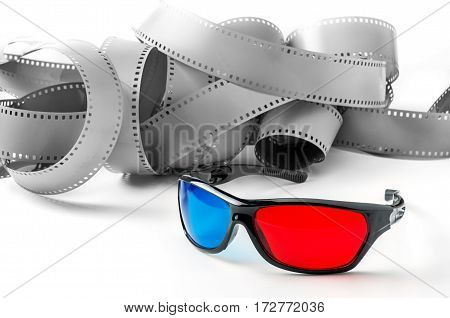 3d glasses and film strip on a white background