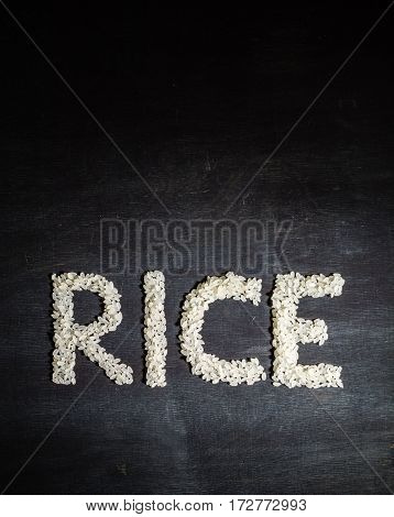Rice In The Form Of Words. View From Above.