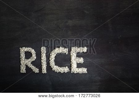 Rice In The Form Of Words. View From Above.