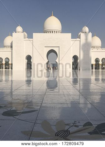ABU DHABI, UAE-FEB 11, 2017: Sheikh Zayed Grand Mosque in Abu Dhabi, United Arab Emirates. It is the key place of worship and may be visited by more than 40,000 people during Eid.