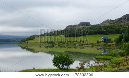 A quaint cottage by the lake in Iceland