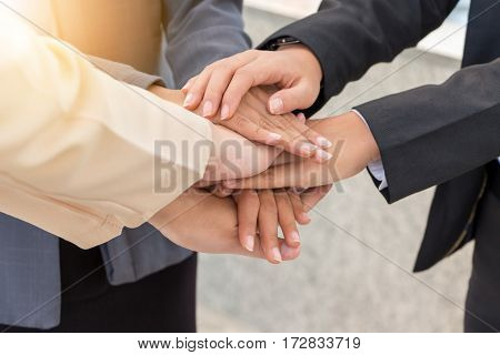 Business People Joining Hands Success Teamwork and Partnership Concept.