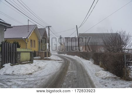 Fog Morning In Spisske Tomasovce Winter Village