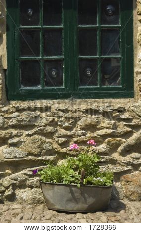 .Cottage Window With Planter