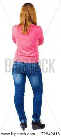 back view of standing beautiful brunette woman . Young girl in jeans .  Rear view people collection.  Isolated over white background.  backside view of person.  Isolated over white background.