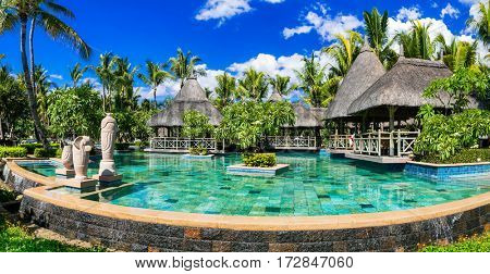 Tropical vacations. Swimming pool and lounge bar in Mauritius island