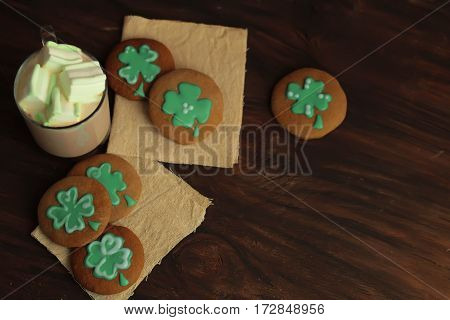 Decorative Cookies On Wooden Background. Saint Patricks Day Concept