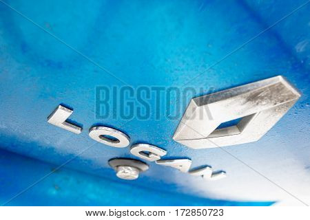 Gomel, Belarus - February 21, 2017: Car Renault - Logan. Renault Brand With The Name Of The Company