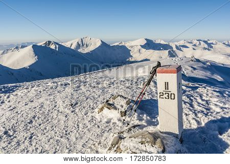 Trekking Poles Based On A Border Post.