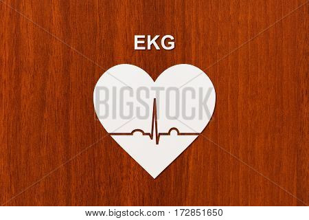 Heart shape with echocardiogram and EKG text. Health or cardiology concept. Abstract conceptual image