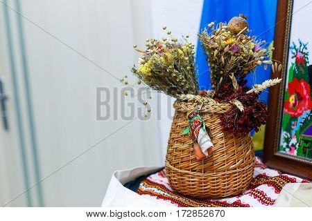 Clay Pot Covered With A Lid And Wheat Sheaf On The Background Fabric Pattern Ukrainian