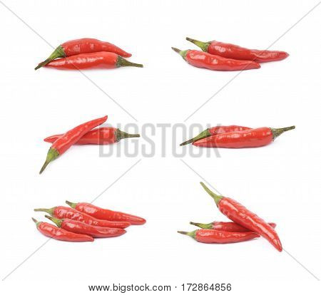 Pile of red italian peppers isolated over the white background, set of six different foreshortenings