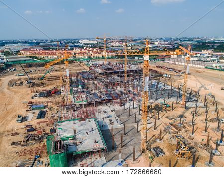 Construction site with cranes. Construction workers are building.Aerial view.Top view.