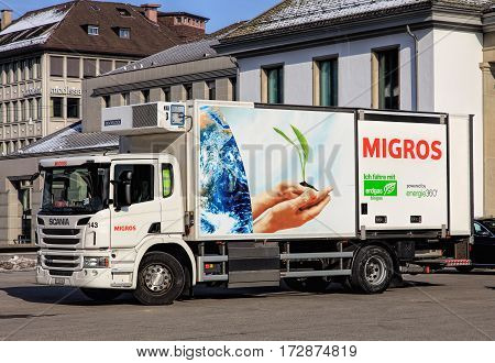 Zurich Switzerland - 27 January 2017: a Scania truck of Migros parked on Rathausbrucke bridge. Migros is Switzerland's largest retail company its largest supermarket chain and largest employer.