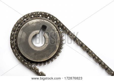 Oiled Cam Shaft With Timing Chain Isolated Over White Background