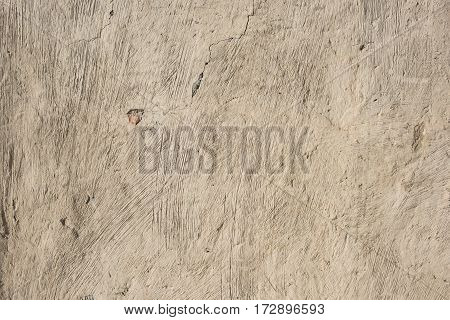 Old beige concrete relief background wall texture