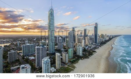 Aerial view of sunset over Surfers Paradise and beach, view looking north. Gold Coast Australia