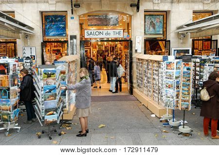 People Shopping At A Souvenir Shop Of Paris
