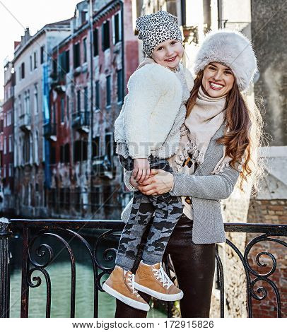 Mother And Daughter Travellers In Venice, Italy In Winter
