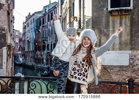Smiling Mother And Child In Venice, Italy Travellers Rejoicing