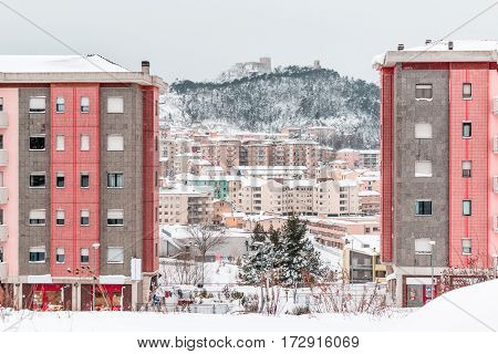 snowy panorama of Campobasso between two palace