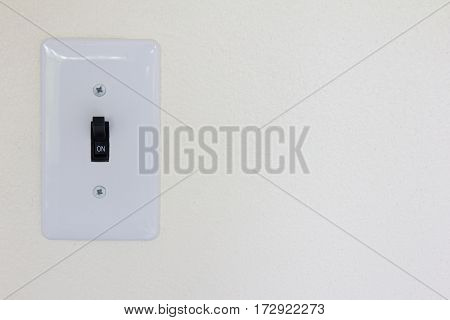 White switch st on state background (Concept for save energy or turn on idea)