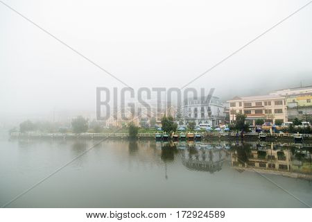 Vietnam's town on the mountain in the Early Morning Mist. Sapa Vietnam