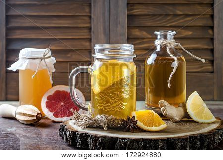 Homemade fermented raw kombucha tea with different flavorings. Healthy natural probiotic flavored drink. Copy space